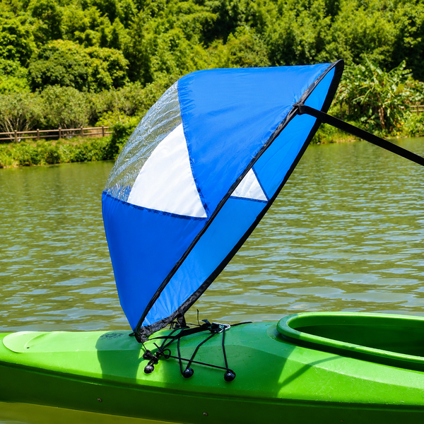 Blue kayak sail mounted on kayak
